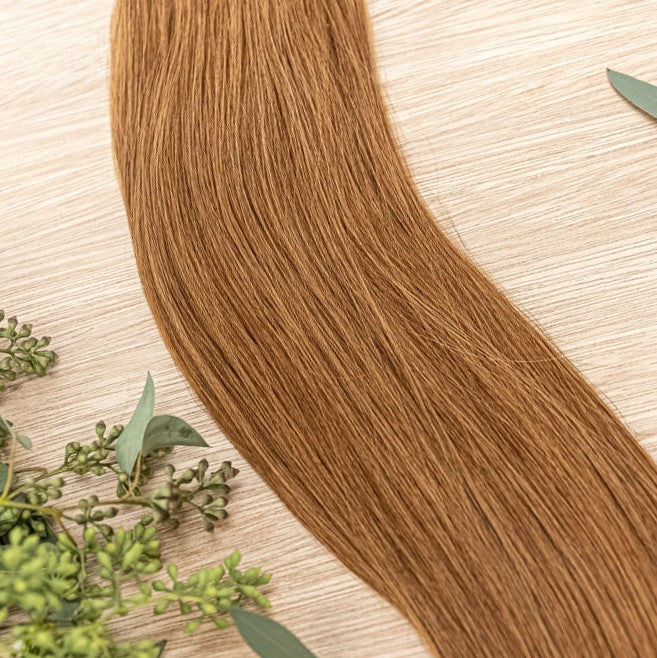 CEDAR NATURAL TAPE Cedar weft is a 22" weft featuring natural-toned level 8 warm copper. Our natural tape hair extensions are carefully crafted to ensure a natural appearance and seamless blending. The hair is placed on the outside of the tape, allowing i