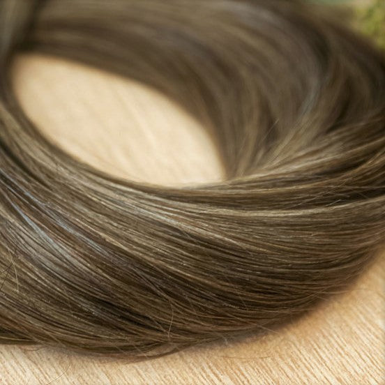 CYPRESS CLIP IN Cypress clip-in hair extensions are 22 inches in length and made of a gorgeous weft of piano natural-toned level 4 and neutral 8 ash blonde- rooted in a natural level 8. They provide instant density and length when applied to the hair. The