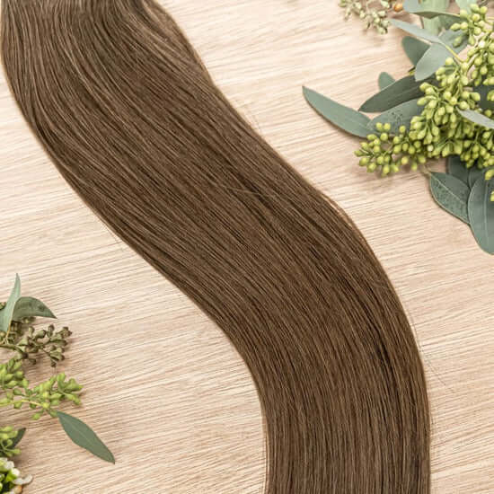 26 INCH CUSTOM NATURAL TAPE NOW SOLD IN 100 GRAM BUNDLES WITH 2 PACKS IN EACH ORDER. OUR NATURAL TAPE HAIR EXTENSIONS ARE SEAMLESS AND BLENDABLE. OUR HAIR IS ON THE OUTSIDE OF THE TAPE ALL THE WAY TO THE ROOT TO ENSURE IT LOOKS AND BLENDS NATURALLY. OUR C